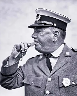Serve Prints: 1920s 1930s TRAFFIC POLICEMAN BLOWING WHISTLE WEARING UNIFORM