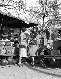 Produce Prints: 1920S Couple Women Man At Roadside Produce Stand Buying Pumpkins