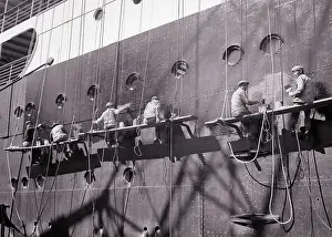 Maintenance Prints: 1930s 1940s MEN PORT WORKERS SITTING ON SWING STAGE SCAFFOLDING PAINTING SIDE OF SHIP THE SS ARGENTINA IN BUENOS AIRES