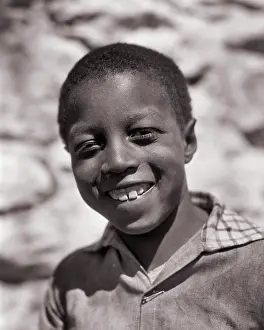 Dreams Prints: 1930s AFRICAN-AMERICAN BOY LOOKING AT CAMERA GREAT DEPRESSION ERA PORTRAIT