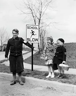 Small Group Of People Prints: 1930S Two Children Boy Girl Waiting To Cross Street Crossing Guard