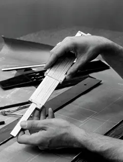 Slide Prints: 1930S Man'S Hands Using Slide Rule Over Drafting Table