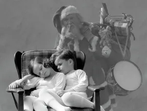 Small Group Of People Prints: 1930S Santa Claus Finger To Lips Sack Of Christmas Toy Presents Over Shoulder Ghost Behind Boy And Girl Asleep In Chair