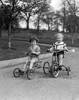 Biking Prints: 1930S Two Smiling Boys Riding Tricycles