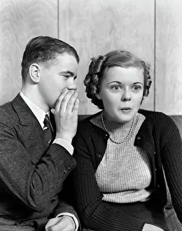 Speak Prints: 1940S 1930S Young Teenage Couple Boy Whispering Into Girl'S Ear Girl With Amazed Surprised Expression
