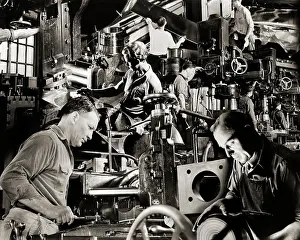 Manufacturing Prints: 1940s 1940s MONTAGE OF MEN WORKING AT LATHES AND OTHER MANUFACTURING MACHINES