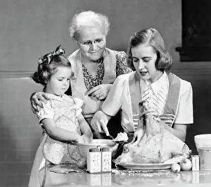 Grandma Prints: 1940s 1950s MOTHER DAUGHTER GRANDMOTHER STUFFING THANKSGIVING TURKEY
