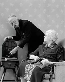 Grandfather Prints: 1940S Elderly Couple Listening To Radio While She Knits