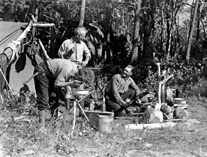 Tent Prints: 1940S Men At Campsite One Washing His Face At Tripod Stand The Other Tending Campfire Canada Lake Of The Woods Ontario