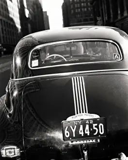 Autos Prints: 1940s REAR VIEW SHOWING GASOLINE RATION CARD DECAL STICKERS A AND C ON BACK WINDOW PONTIAC SEDAN AUTOMOBILE DURING WW2