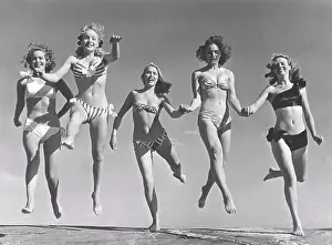 Grownups Prints: 1940s summer. A group of young women in their bikinis are happy on this summer's day