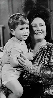 : 1950... The young Prince with Elizabeth now the Queen Mother