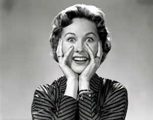 People Adults Prints: 1950S 1960S Portrait Of Wacky Woman Hands On Face With Smiling Excited Happy Funny Face Surprised Expression Looking At