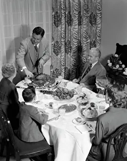 Tableware Prints: 1950S 3 Generations Thanksgiving Dinner With Father Carving Turkey