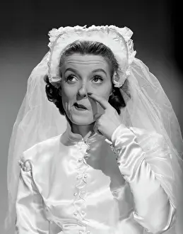 Thoughtful Prints: 1950S Bride Scratching Nose And Looking Up