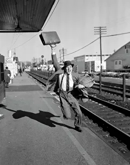 Case Prints: 1950S Businessman With Briefcase In Air Running After Departing Train