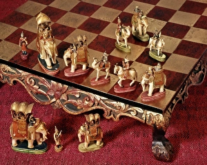 Players Prints: 1950s CHESS SET IN STYLE OF INDIA ELEPHANTS AND MAHARAJA HUNTING PARTY ON RAISED ORNATE CHESSBOARD