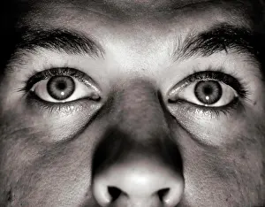 Expressions Prints: 1950s CLOSE-UP OF PAIR OF HUMAN EYES LOOKING AT CAMERA WITH A MENACING EXPRESSION