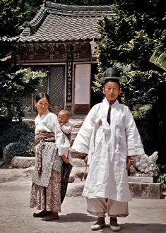 Married Prints: 1950s FAMILY TRADITIONAL CLOTHES BABY IN SLING WOMAN IN HANBOK OF CHIMA AND JEOGORI MAN IN BAJI PANTS AND HAT PUSAN