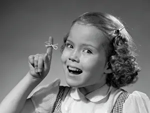 Story Prints: 1950S Little Girl String Tied On Finger As Reminder Not To Forget Smiling
