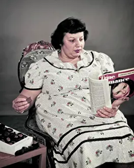 Weight Prints: 1950s OBESE OVERWEIGHT WOMAN SITTING EATING BOX OF CHOCOLATE CANDY READING MOVIE FAN MAGAZINE