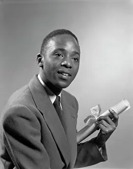 1950S Portrait African American Man Holding Graduation Diploma