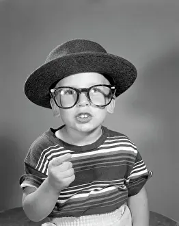 Fingers Prints: 1950S Portrait Boy Dressing Up In Adult Business Man'S Hat And Glasses Wearing Striped Tee Shirt