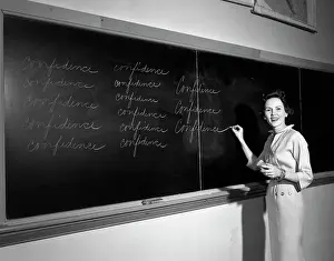 People Adults Prints: 1950S Teacher In Front Of Classroom Writing Confidence On Blackboard