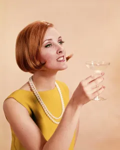 Red Hair Prints: 1960s FASHIONABLE RED HEADED WOMAN TOASTING HOLDING GLASS OF CHAMPAGNE