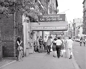 Dreams Prints: 1960s GREENWICH VILLAGE CITY STREET SCENE GROUP OF YOUNG ADULTS WALKING ALONG PAST THE PURPLE ONION A FAMOUS GO-GO BAR