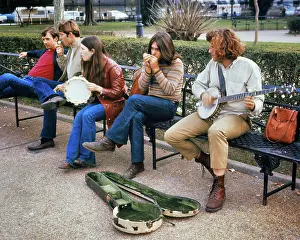 Sound Prints: 1960s HIPPIE STREET MUSICIANS YOUNG MEN AND WOMAN BUSKING PLAYING FOR COINS IN JACKSON SQUARE IN NEW ORLEANS LOUISIANA