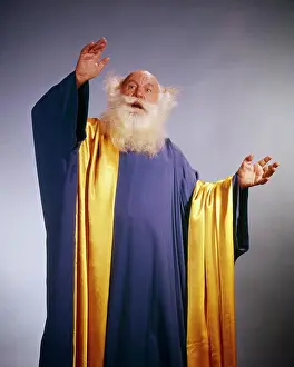 Dreams Prints: 1960s SENIOR MAN CHARACTER WHITE BEARD LONG BLUE AND GOLD ROBES ARMS RAISED PROPHET PREACHER MYSTIC SEER ORACLE FORTUNE
