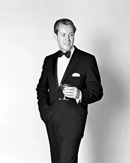 Oldtime Prints: 1960s SMILING MAN WEARING TUXEDO HOLDING CHAMPAGNE GLASS