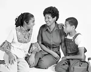 Sons Prints: 1970s AFRICAN AMERICAN MOTHER DAUGHTER SON FAMILY SITTING PORTRAIT
