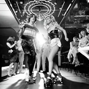 Spotlight Prints: 1970S Couple Disco Dancing On Roller Skates Wearing Trendy Clothes Under A Mirrored Ball