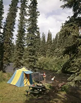 Tent Prints: 1970s COUPLE MAN WOMAN FISHING IN STREAM CAMPSITE WITH TENT