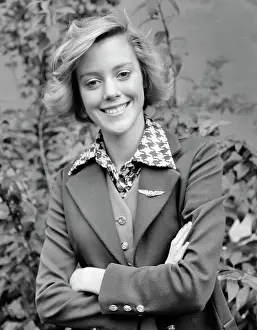 Oldtime Prints: 1970s PORTRAIT SMILING AIRLINE FLIGHT ATTENDANT WEARING WING PIN ON LAPEL STEWARDESS LOOKING AT CAMERA