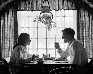 Oldtime Prints: 1970s SILHOUETTED COUPLE EATING BREAKFAST AT TABLE BY WINDOW