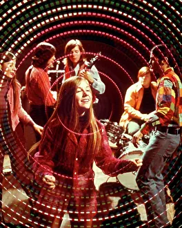 Sound Prints: 1970s TEENAGE ROCK BAND GROUP AND BOYS AND GIRLS DISCO DANCING AMID SWIRLING PSYCHEDELIC LIGHTS AND MUSIC