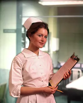 Corridor Prints: 1980S Nurse White Uniform Cap Clip Board Pencil Hospital Corridor Nurses Medical