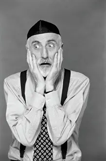 Wear Prints: 1990S Portrait Jewish Man Gray Beard Wearing Yarmulke Both Hands On Face Funny Expression Oy Vey Shock Fear Worry