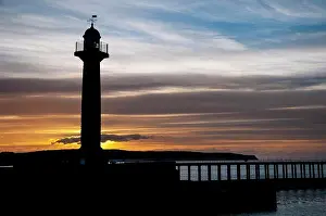 Maritime Prints: 19th century stone lighthouse on pier