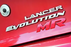 Stationary Prints: 2009 Mitsubishi Lancer Evolution close-up on logo