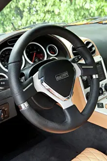 Stationary Prints: 2010 Rossion Q1 sports car showing the steering wheel and instrument panel