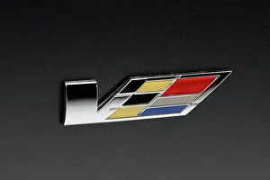 Artificial Light Prints: 2011 Cadillac CTS-V Coupe showing the side badge logo
