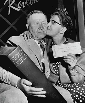 Broadcast Prints: For $32, 000 She Does The Kissing - While her husband