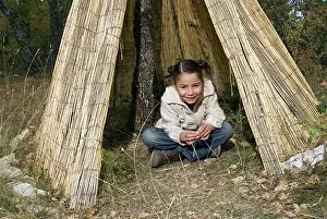 Tent Prints: 5-7 years old kids playing in a tipi