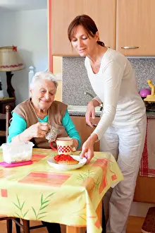 Home Care Worker Prints: 94 years old woman at home