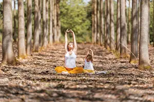 Balance Prints: Adult pregnant woman and little girl with closed eyes in white shirts