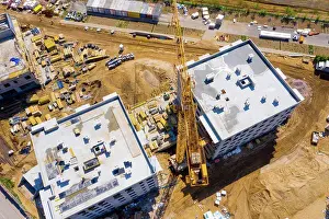 Architectural Prints: Aerial Bird Eye View Of a Construction Site Building Cranes Look